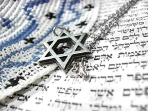 Jewish star, kippa and Hebrew text