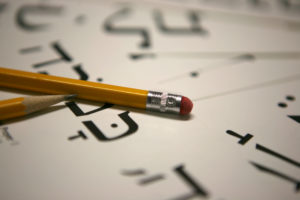 Hebrew letters with a pencil on paper